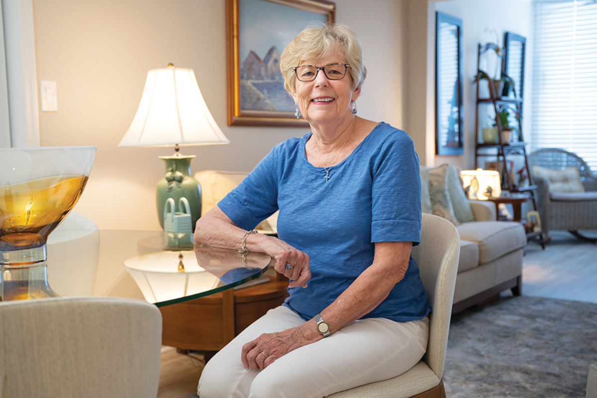 Joanne Judy, "JJ," sits in her well-appointed home at the Mayflower at Winter Park